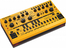Behringer TD-3-MO-AM басовый синтезатор, встроенный дисторшн, VCO, VCF, VCA, 16-шаговый секвенсор, 16 голосов. Желтый с красным